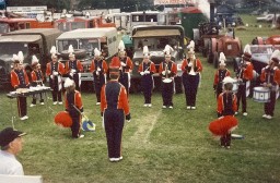 The Band of The Royal Husars plays in front of the procession formed up in the Treacle Fair Arena